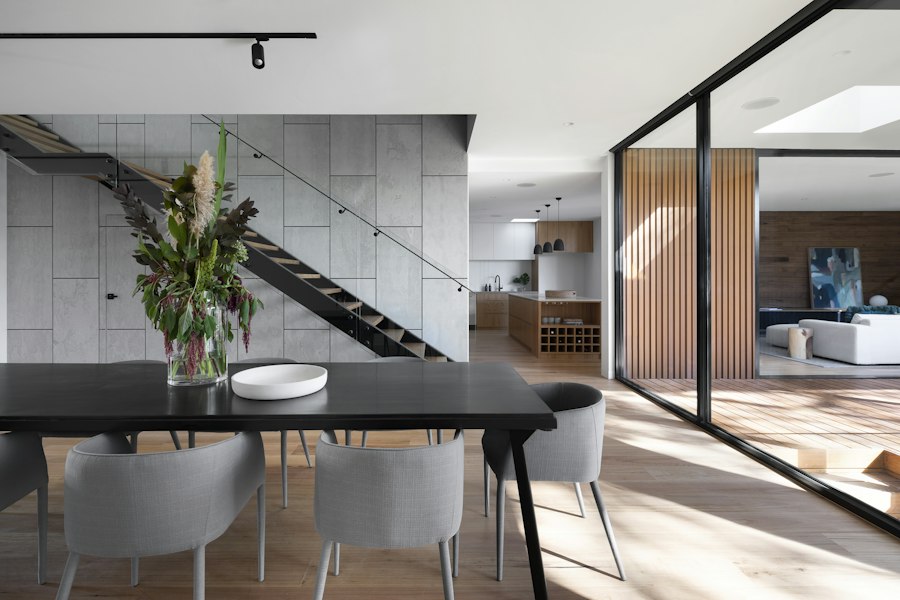 Illustrative modern interior with large sliding glass doors